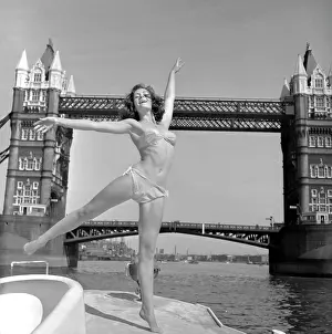 Windswept: Young woman modelling on a boat