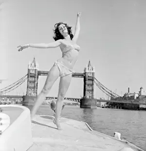 Windswept: Young woman modelling on a boat