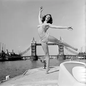 Windswept: Young woman modelling on a boat