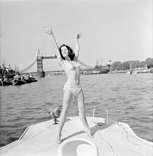 Windswept: Young woman modelling on a boat