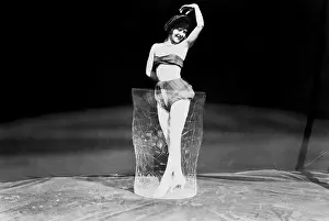 Nightfall: Young woman in an oversized glass