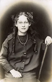 Ringlets: Young woman with ringlets and bow, USA