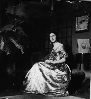 Satin: Young woman in a satin dress, Italy