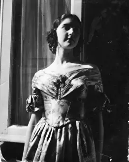 Satin: Young woman in a satin dress, Italy