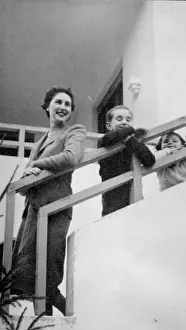Railing: Young woman with son and daughter