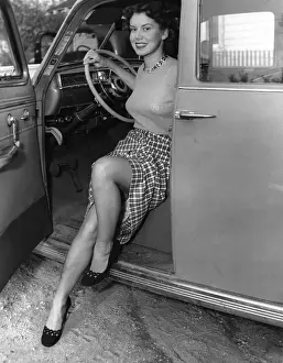 Camerique: Young Woman Stepping Out Of A Car