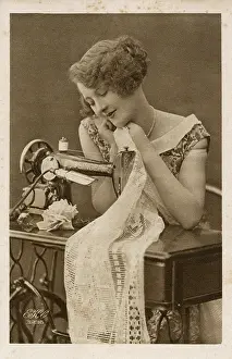 Sews: Young woman using a Singer Sewing Machine