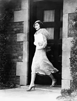 Brisk: Young woman walking out door