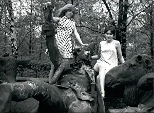 Unfortunately: Two young women with fallen sculpture, Germany