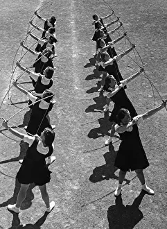 Sportswomen: Young women practicing archery in Italy, 1930's