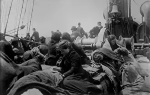 Steerage: A young women reading on the steerage deck ?