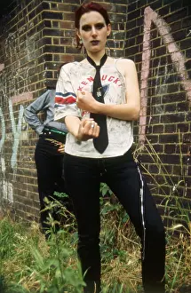 Ripped: Youthful trendy model in an urban setting