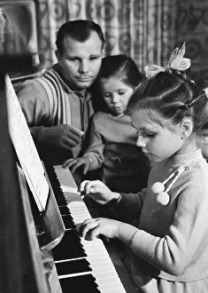 Lena: Yuri Gagarin with daughters Galya and Lena, 1966