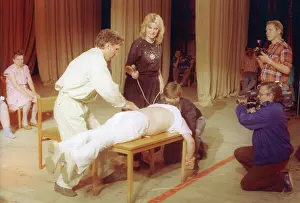 Therapy: Yu.V.Tarasov heals a patient by a manual therapy method.1990