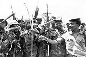 Camerapix: Zaire officer checks one of his men using bow